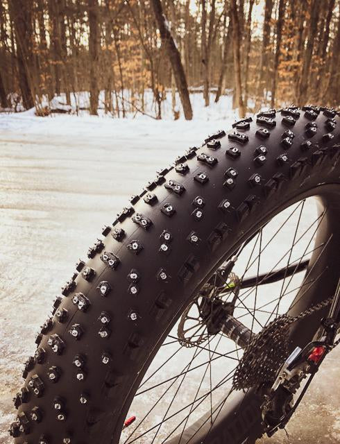 SS-06R iGrip 6mm shouldered racing tire studs providing precision traction and control on icy racing tracks