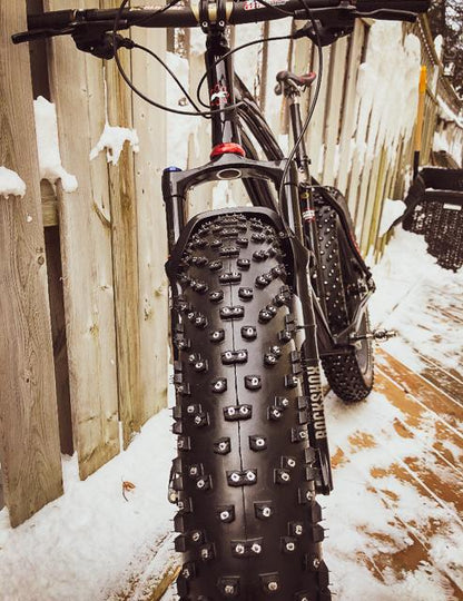 SS-06R iGrip 6mm shouldered racing tire studs providing precision traction and control on icy racing tracks