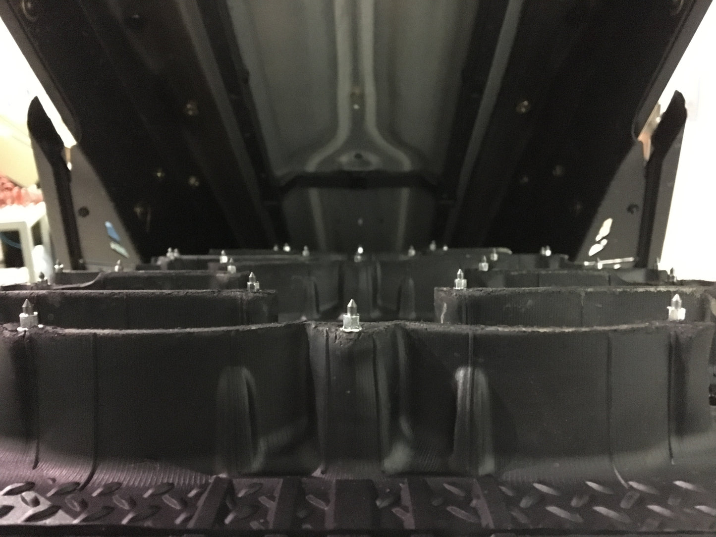 SS-32R iGrip 32mm shouldered racing tire studs providing professional traction and control on icy racing tracks