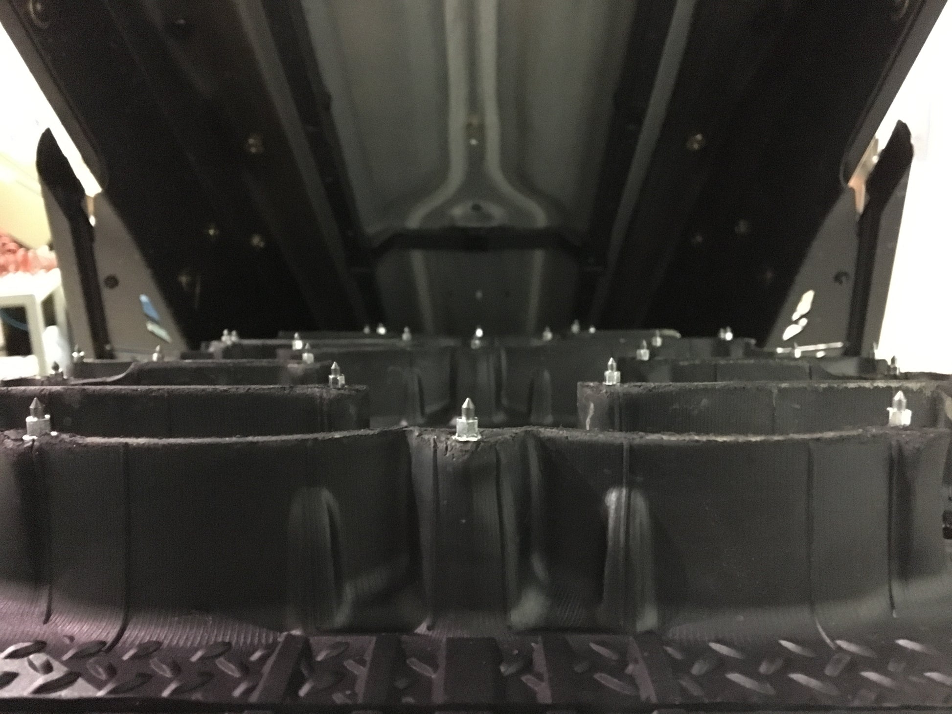 SS-32R iGrip 32mm shouldered racing tire studs providing professional traction and control on icy racing tracks